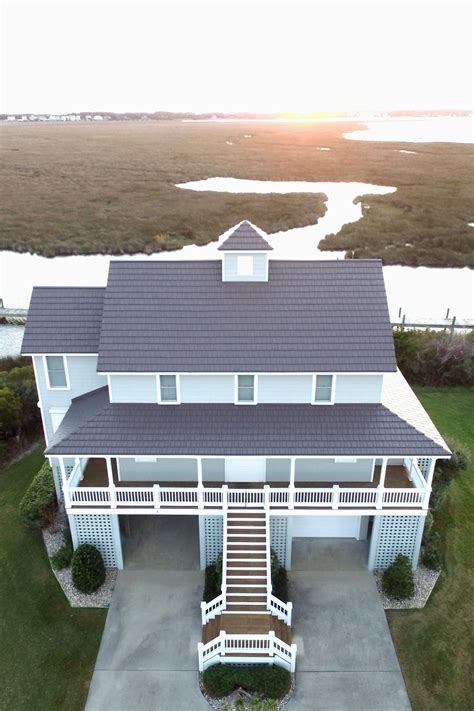 red metal roof house beach|metal roof coastal house.